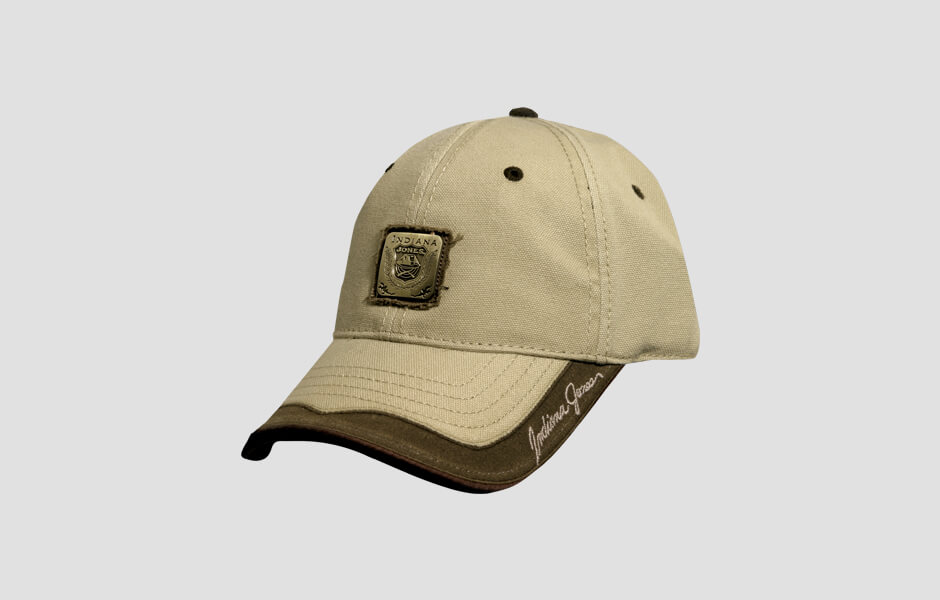 A ball cap Indiana Jones hat with front facing emblem and signature on the brim